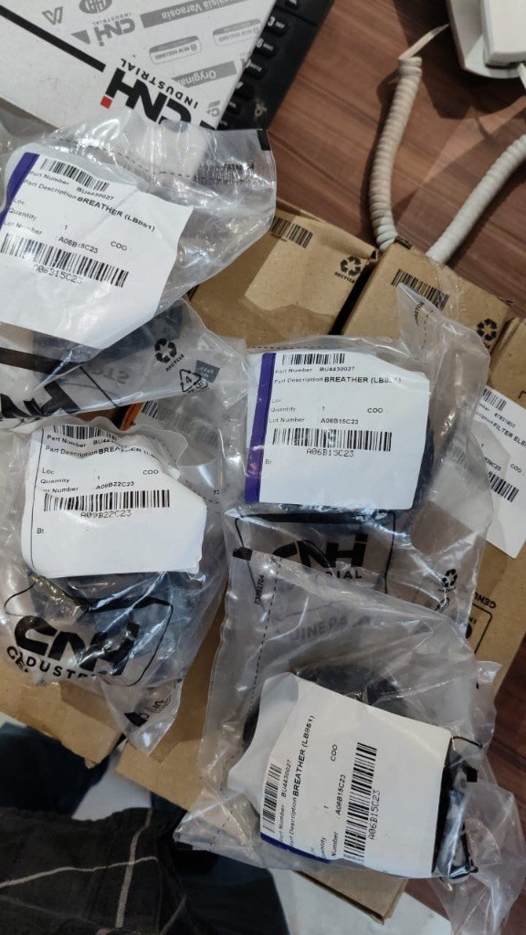 Related CNH breather inquiry via WhatsApp — BU4430027 BREATHER (LBBS1) bags shown for reference only, NOT V006180/01034 stock — separate part number