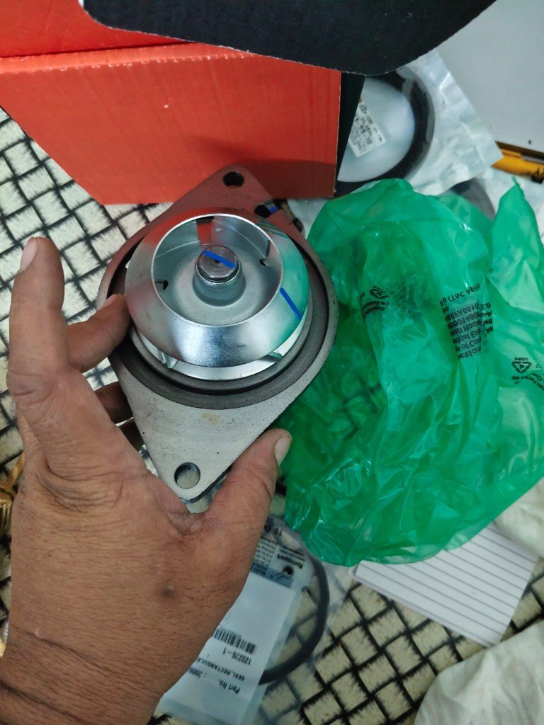Cummins 3238366 water pump metal iron impeller view with seal 3906698 — warehouse photo India export