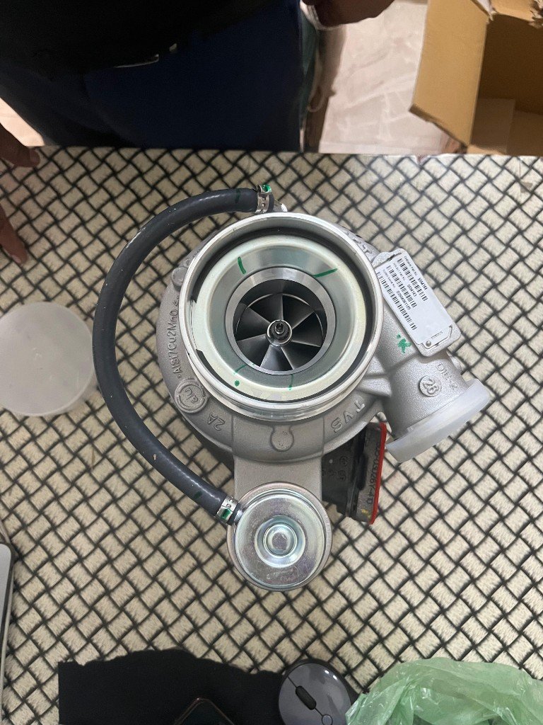 Holset HE300WG turbo nameplate 5554144 5554143 model verification — source desk photo India export
