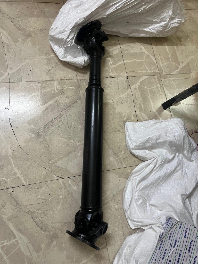 JCB cross-reference intermediate propeller shaft 335/H1426 full assembly slip joint both flanges — warehouse photo — Pioneer Mitra independent export supplier India