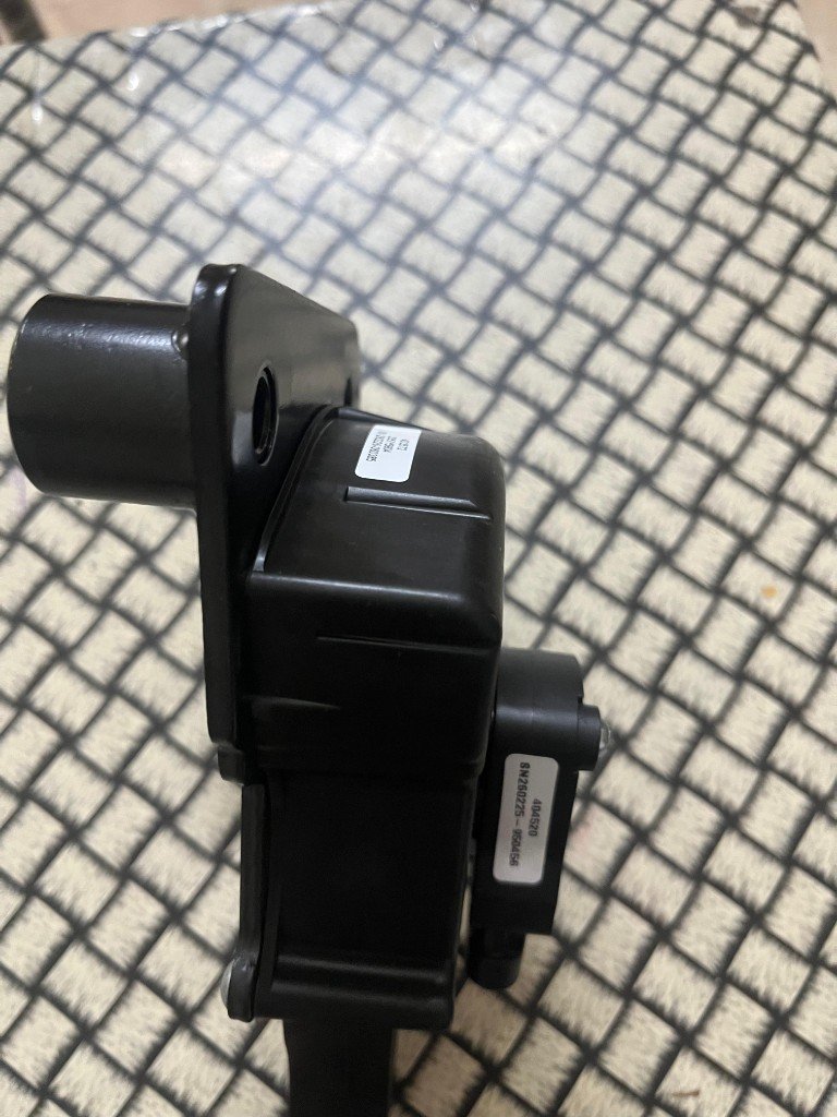 JCB cross-reference 335/Y5904 complete foot pedal assembly — sensor housing label 403572 and serial number — warehouse photo — Pioneer Mitra independent export supplier India