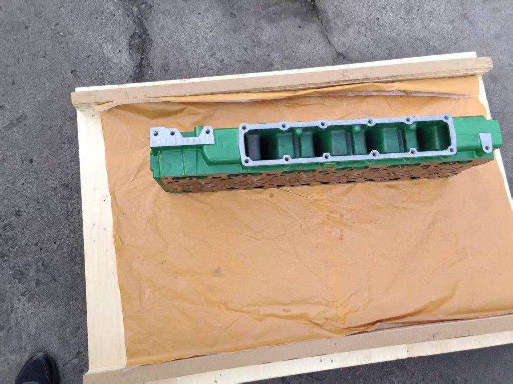 John Deere cylinder head prepared for export crating — diesel engine spare parts FOB India