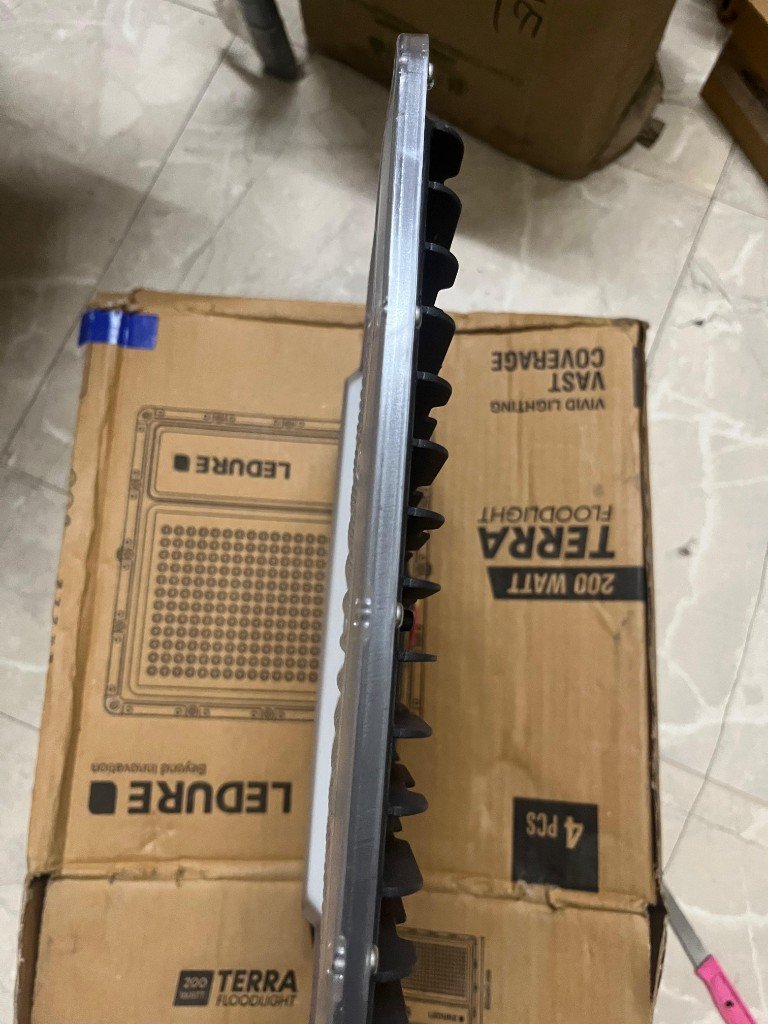 LEDURE Terra 200W floodlight slim side profile mounting bracket — warehouse verification photo