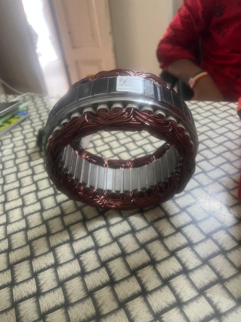 Lucas TVS 26218958 alternator stator top view with SIA140 24V 80A identification label — warehouse photo Pioneer Mitra