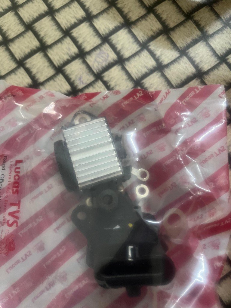 Lucas TVS Leaders in Auto Electricals branded packaging with 26218968 alternator cutout regulator unit — warehouse source photo Pioneer Mitra