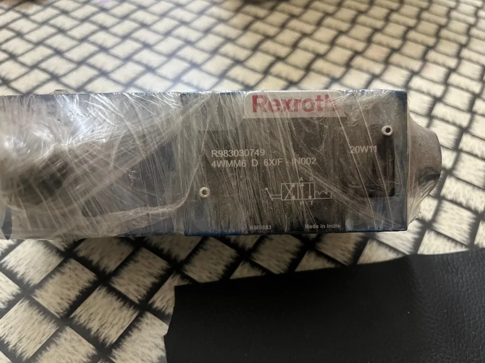 Rexroth R983030749 hydraulic directional spool valve nameplate closeup Escorts roller cross reference