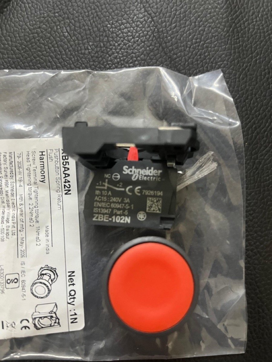 Schneider XB5AA42N red push button packaging label Harmony Made in India May-2024 with ZBE-102N NC contact block