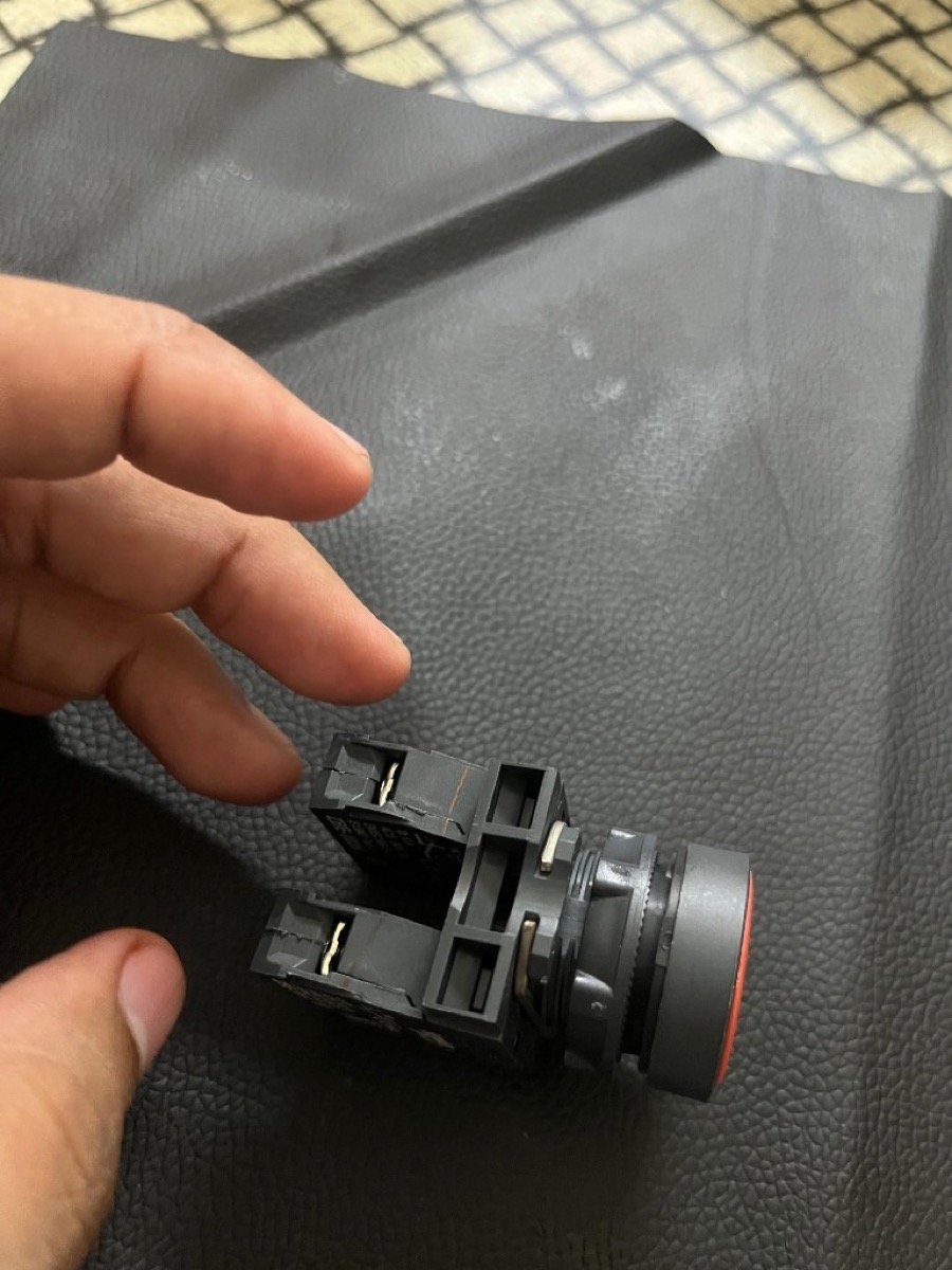 Schneider Harmony red push button modular assembly with contact blocks attached — 22mm spring return flush