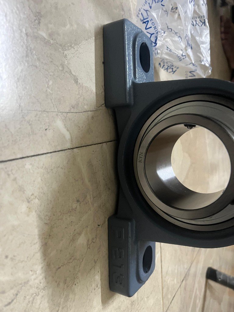 UCP213 KYN BEARINGS marking on UC213 insert P213 housing with export packaging — warehouse source photo