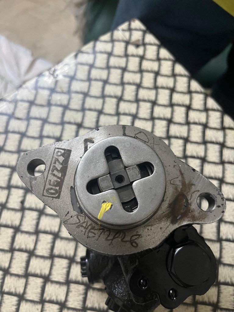 ZF 7673955810 steering pump drive flange face 06/22 stamp DHEM1428 handwritten — warehouse source photo Pioneer Mitra