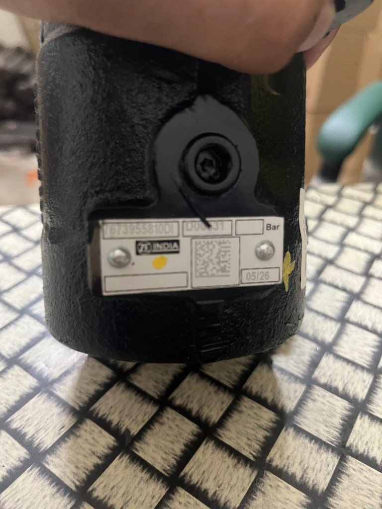 ZF cross-reference power steering pump 7673955810 nameplate ZF INDIA 7673955810DI D00631 05/26 QR code — warehouse photo — Pioneer Mitra independent export supplier India
