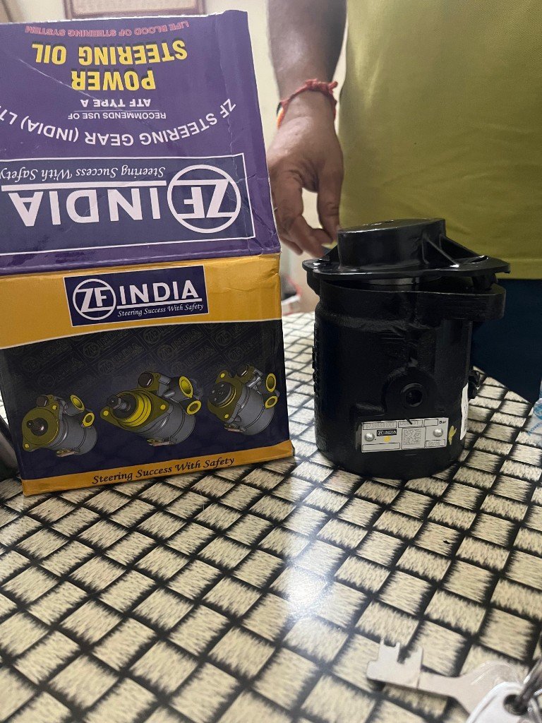 ZF 7673955810 power steering pump with ZF INDIA retail box — multi-angle warehouse photo independent export supplier