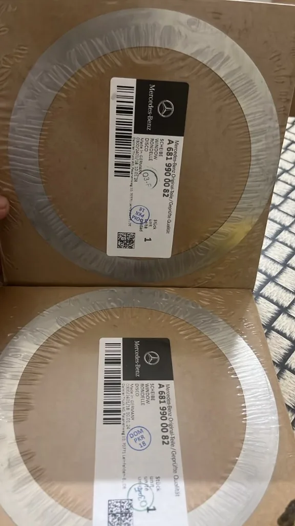 BharatBenz compensating disc A6819900082 packaging — shrink-wrapped units batch 03/2403/18 DOM PKR 18 stamp