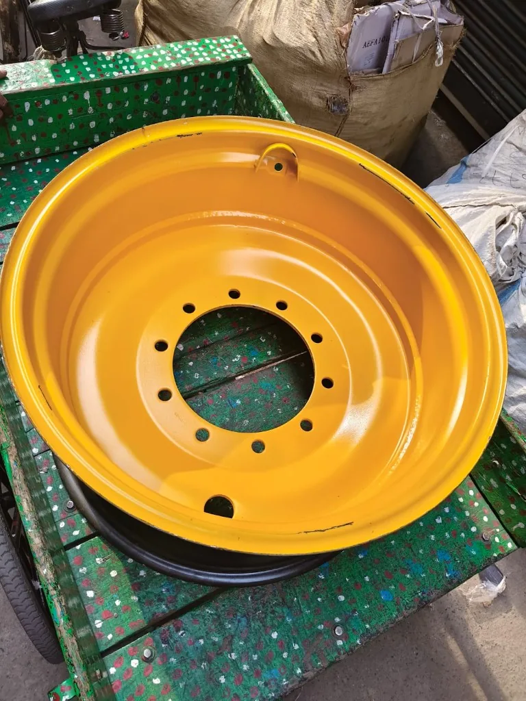 Yellow heavy-duty industrial wheel rim top view — 10-hole bolt pattern deep dish warehouse export photo