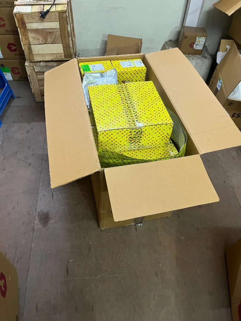 Escorts Kubota STUD S7620860520 bags in shipping box — fastener export stock warehouse photo