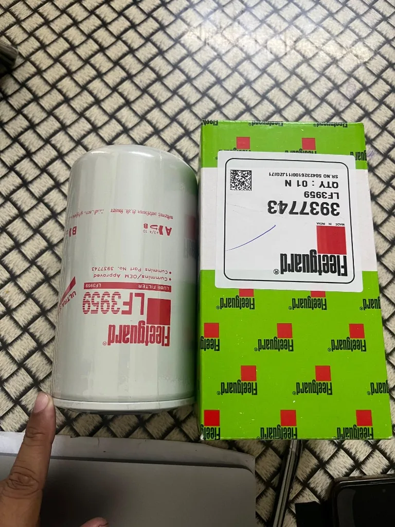 Fleetguard LF3959 oil filter canister — Cummins OEM Approved marking 3937743 warehouse stock photo