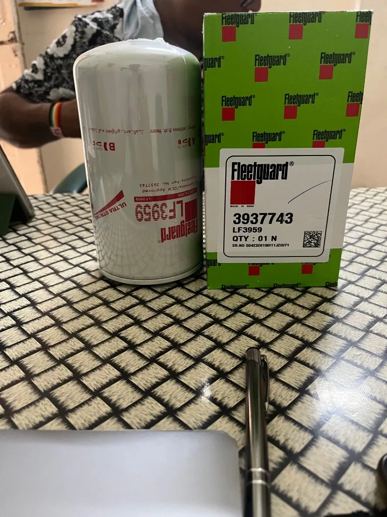 Fleetguard LF3959 lube filter warehouse stack with export cartons — bulk export stock New Delhi Pioneer Mitra