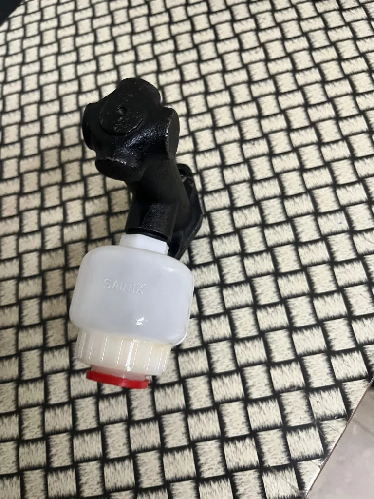 Forklift brake master cylinder — fluid reservoir detail (warehouse reference caption)