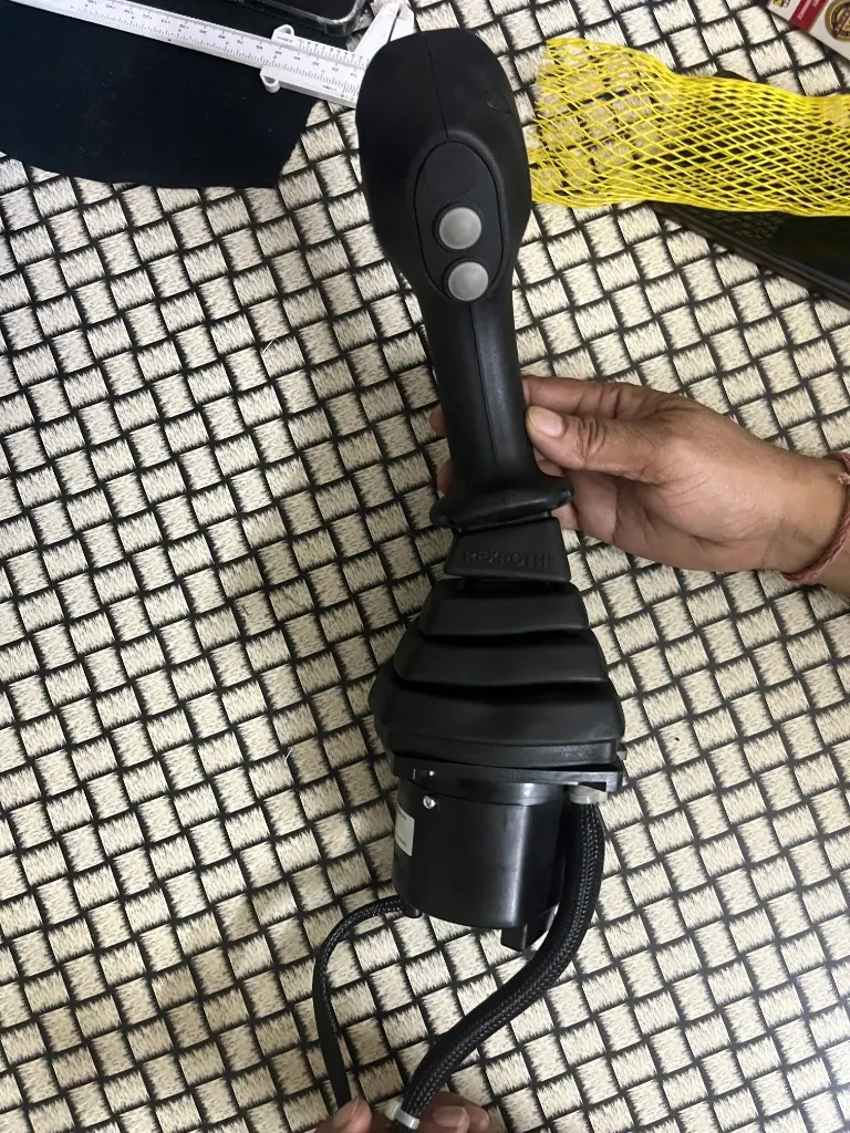 JCB 333/X7764 Rexroth joystick side view two rear buttons