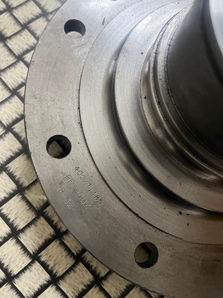 Stamped 402/T1485 on JCB bearing cover casting