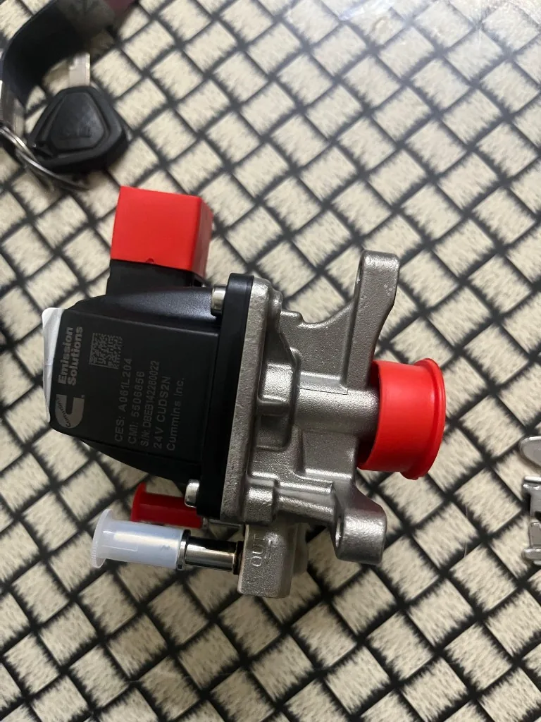 Part No. A061L204 AdBlue urea dosing valve SCR doser export from India warehouse photo — connector and body angle
