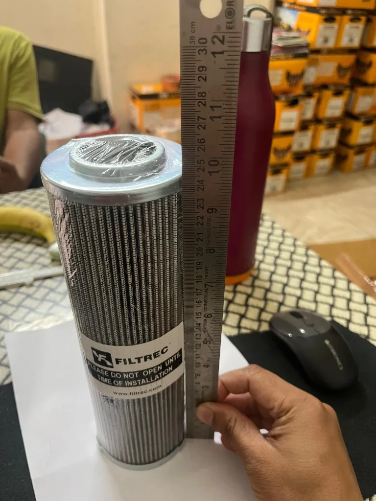 XD250G series hydraulic filter element height ~25 cm — ruler measurement warehouse photo