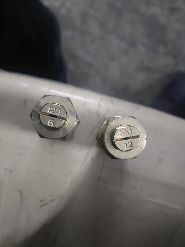 Brass spray tips stamped 120 6 and 120 12