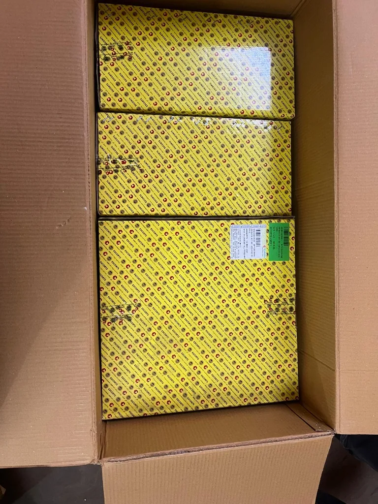 Part No. SK002403N00 Service Kit 500 Hours — three Escorts Kubota labelled boxes in export carton warehouse photo