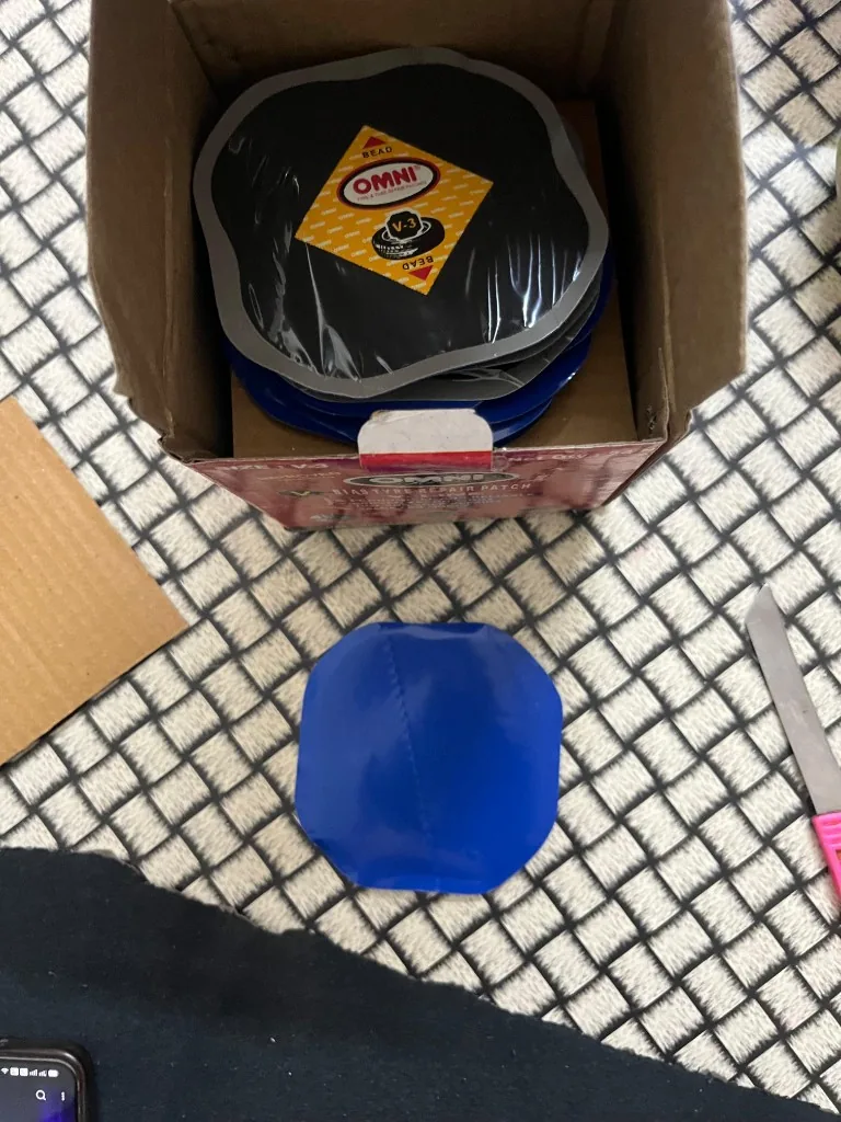 Omni Rubber V3 tyre repair patch box side label BIAS TYRE REPAIR PATCH stack of patches warehouse stock Pioneer Mitra